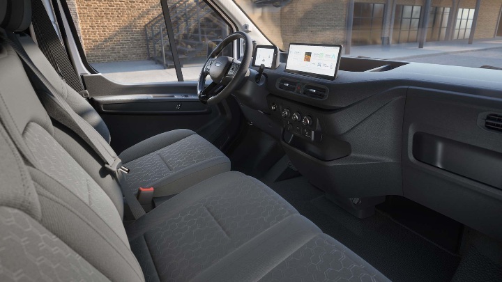 Interior of the Ford Transit City van showing front seats, dashboard and infotainment screen