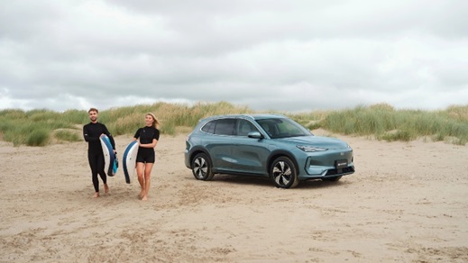 Geely EX5 on Beach with Surfers