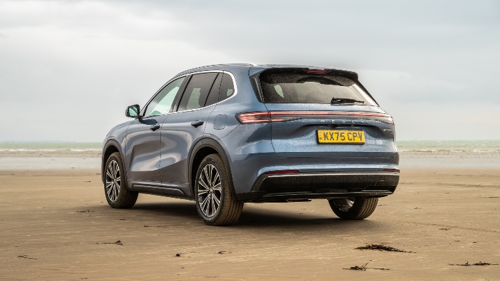 Geely Starray EM-i Grey rear angle beach