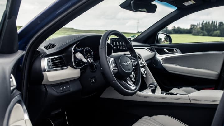 Close up of a Genesis G70 cabin with cream leather