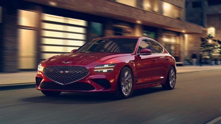 Genesis G70 driving Red