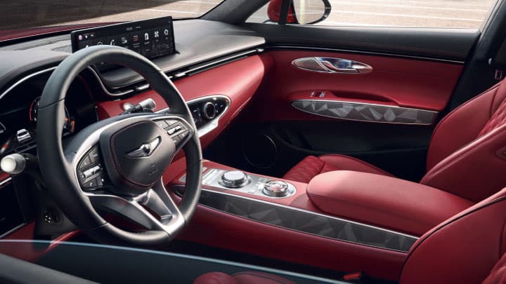 Red Genesis GV70 cabin, whilst looking through side window