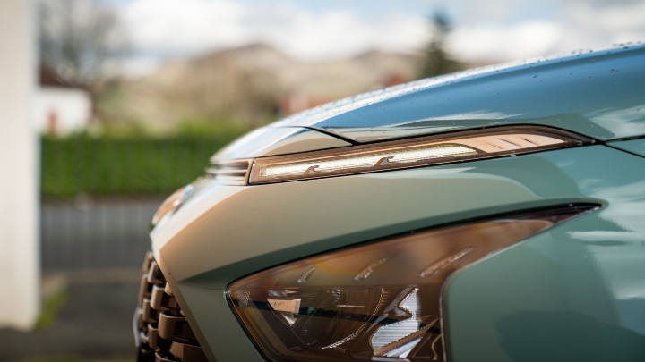 Green Hyundai Bayon close up headlight