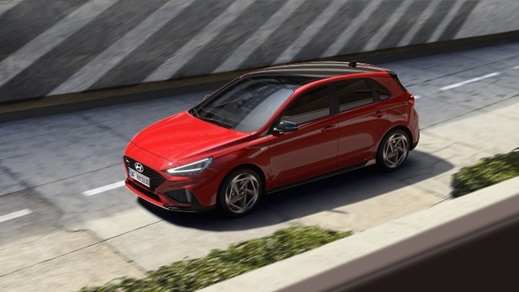 Red Hyundai i30 N-line driving