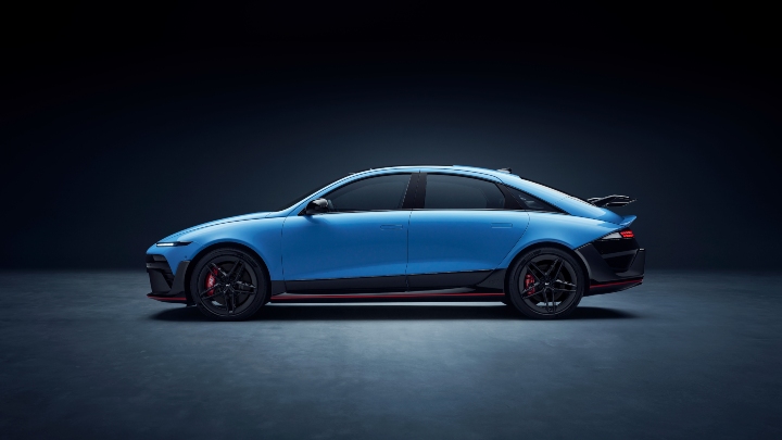 Blue Hyundai IONIQ 6 N electric saloon shown in side profile on a studio background