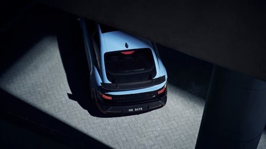 Hyundai IONIQ 6 N shown from an aerial rear view in a modern concrete setting