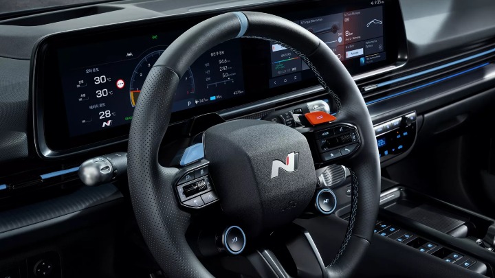 Hyundai IONIQ 6 N interior showing steering wheel and digital driver display