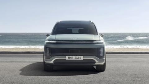 Green Hyundai IONIQ 9 Exterior Front Static On Beach