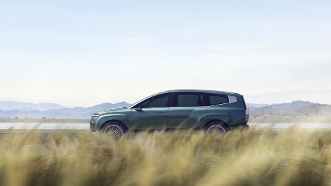 Green Hyundai IONIQ 9 Exterior Side Driving