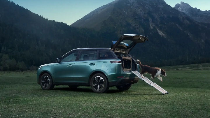 Blue JAECOO E5 Exterior Rear in Countryside with Boot Open and Dog Ramp