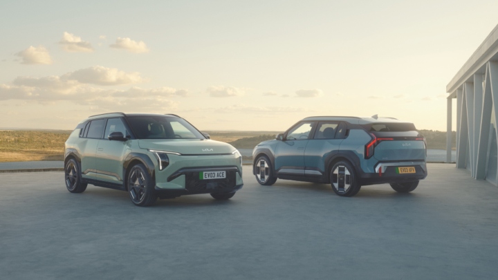 Kia EV3 Duo Outside Contemporary Home with Landscape Background