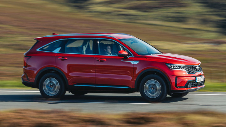 Red Kia Sorento Exterior Side Driving
