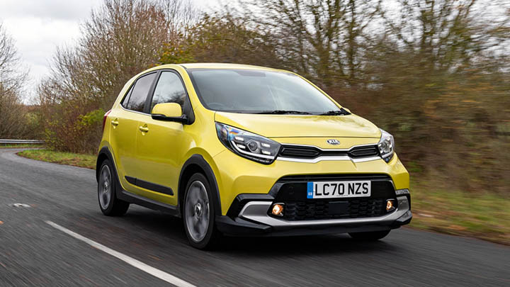 Yellow Kia Picanto, driving