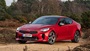 Red Kia Stinger, front quarter