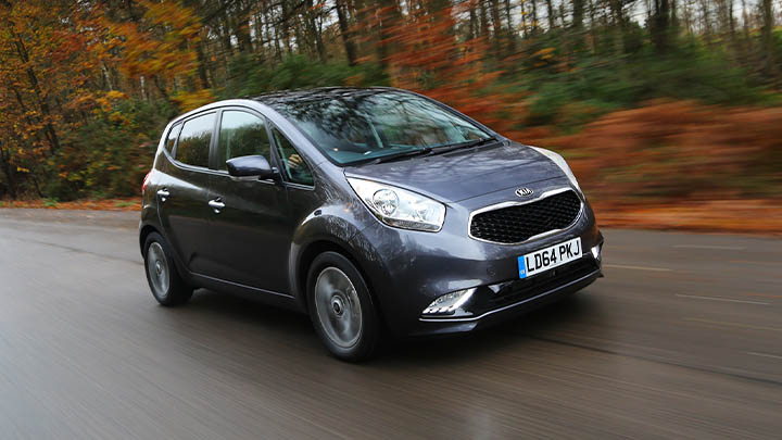 Grey Kia Venga, driving