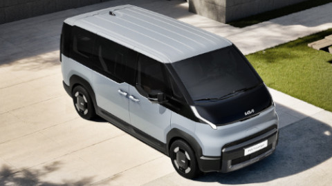 Kia PV5 Passenger in Silver Front Aerial View Parked