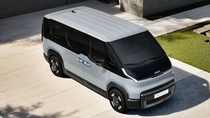 Kia PV5 Passenger in Silver Front Aerial View Parked