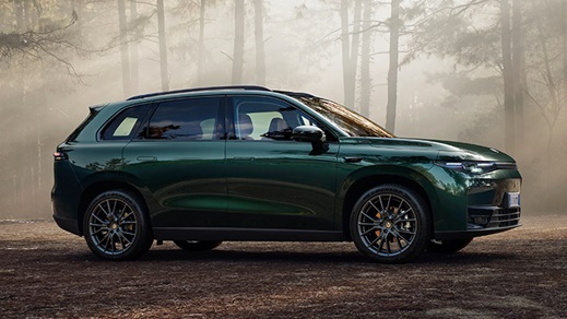 Green Leapmotor C10 exterior shot, parked in a forest