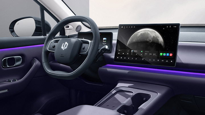 Green Leapmotor C10 interior close up of infotainment system and steering wheel