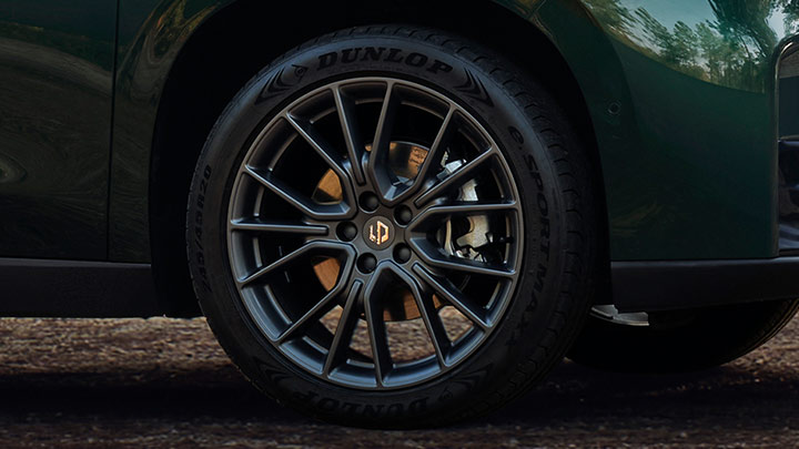 Close up of green Leapmotor C10 alloy wheel and brake caliper