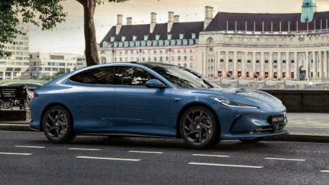 Nevis Blue MG IM5 Parked On Side Of City Street