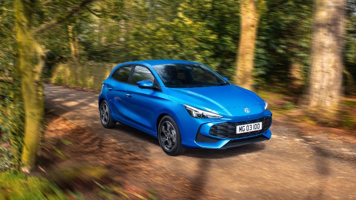 Blue MG3 Exterior Front Driving through Forest Track