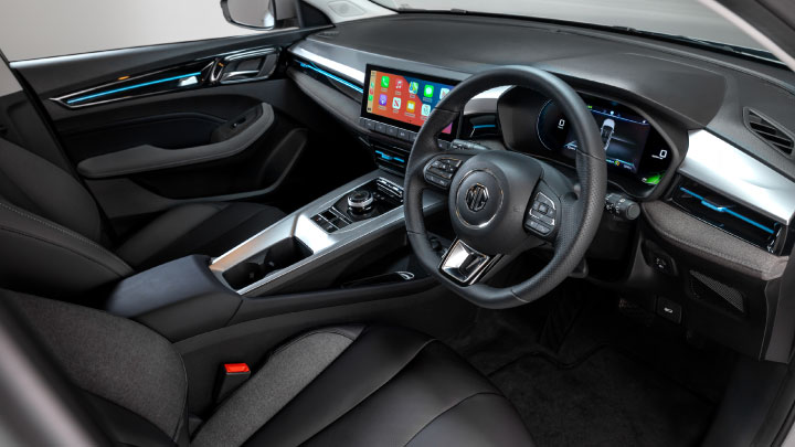 Interior of MG5 EV With Black Leather Steering Wheel, Seats, and Touchscreen Infotainment Screen