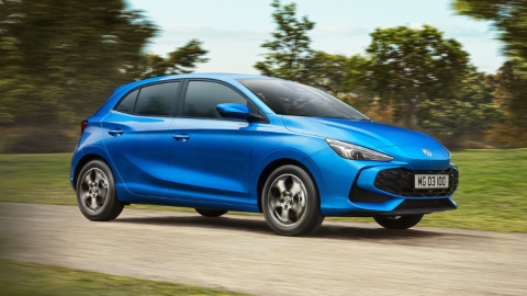 Blue MG3 Hybrid+ Exterior Front Driving in Countryside