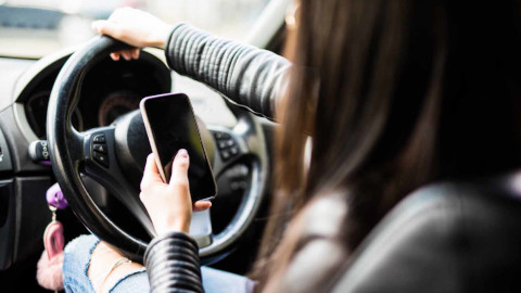 Woman on Mobile Phone Driving