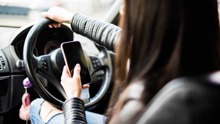 Woman on Mobile Phone Driving