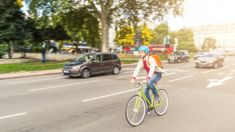 Cyclist and Car on UK Road