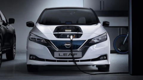 White Nissan Leaf Charging