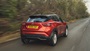 nissan juke driving, rear quarter