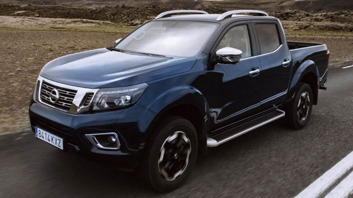 Blue Nissan Navara Exterior Front Static in Rural Area