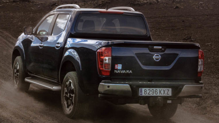 Blue Nissan Navara Exterior Rear Driving Off-Road