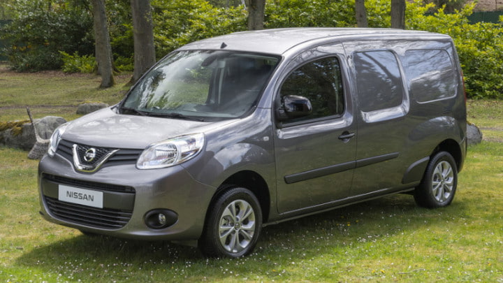 Grey Nissan NV250 Exterior Front Static in Woodland Area