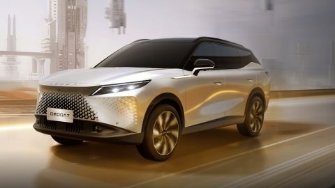 Silver OMODA 7 driving on the road