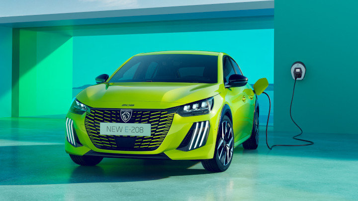Yellow Peugeot 208 Charging
