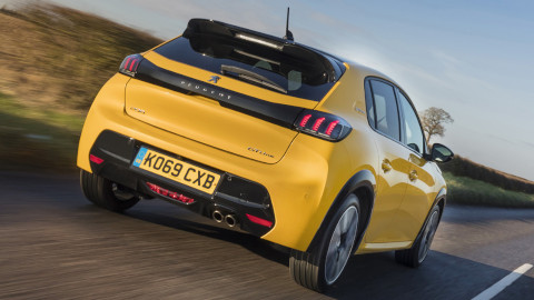 Yellow Peugeot 208 Exterior Rear Driving