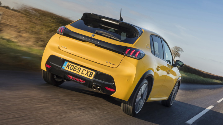 Yellow Peugeot 208 Exterior Rear Driving
