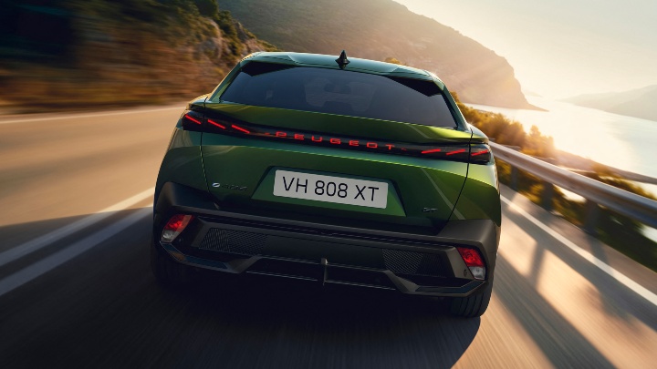 Green Peugeot 408 Exterior Rear Driving