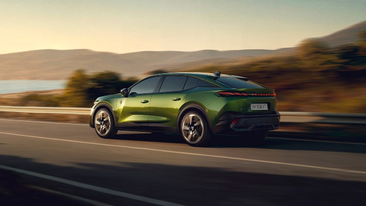 Green Peugeot 408 Exterior Rear Driving