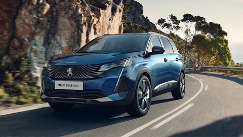 peugeot 5008 suv driving on mountain road