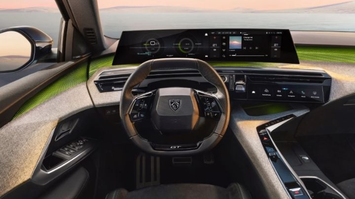 Inside of Peugeot 5008 with a view to the steering wheel, the dashboard touch screen