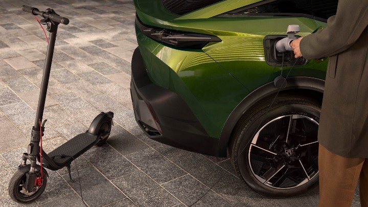 Green Peugeot e-408 Exterior Rear Charging Scooter