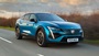 Blue Peugeot 408 Driving