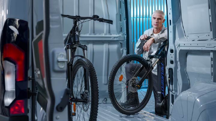Peugeot Boxer being loaded with bikes