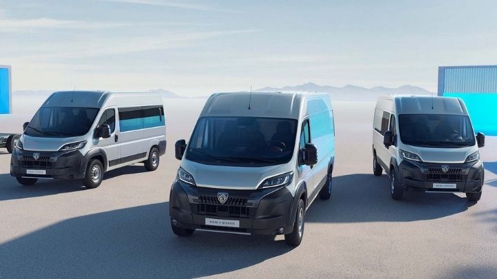 Fleet of Peugeot E-Boxer parked on a grey floor with grey sky in the background