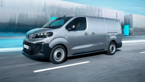 Silver Peugeot Expert driving in the motorway