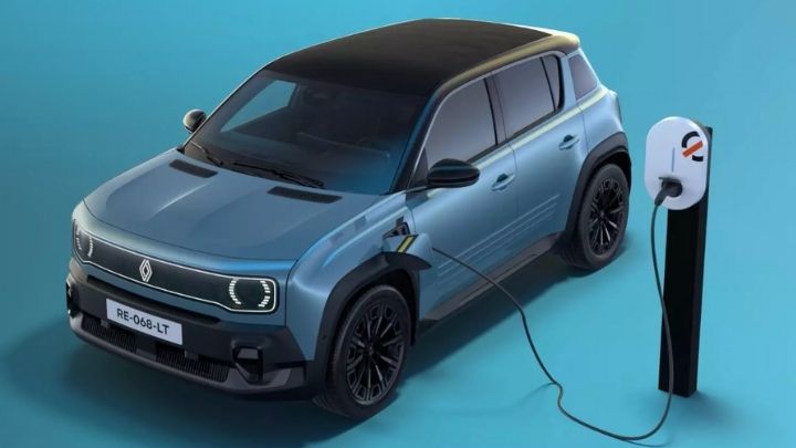 New Renault 4 parked on a blue background whilst being charged